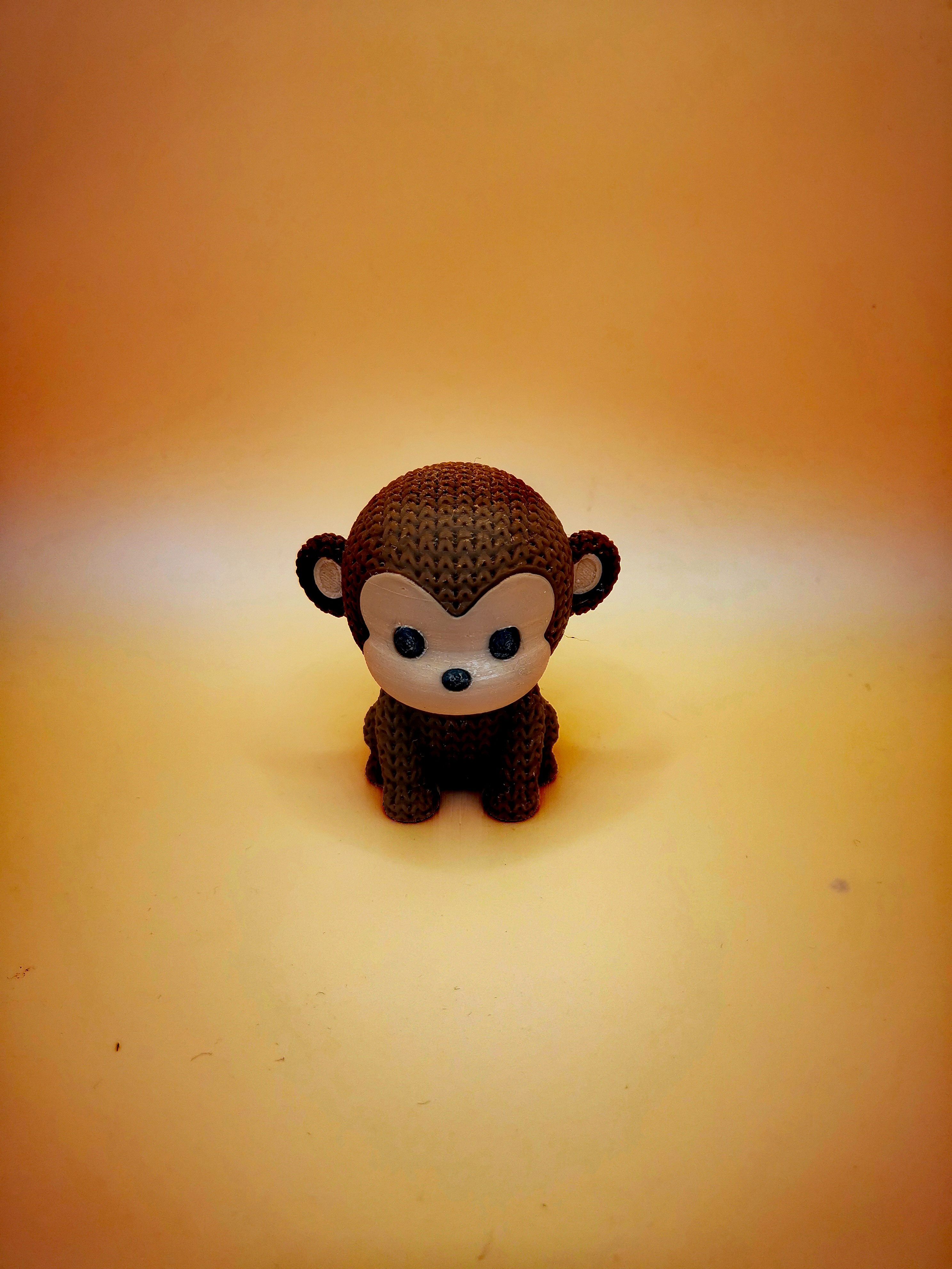 Singe tricoté